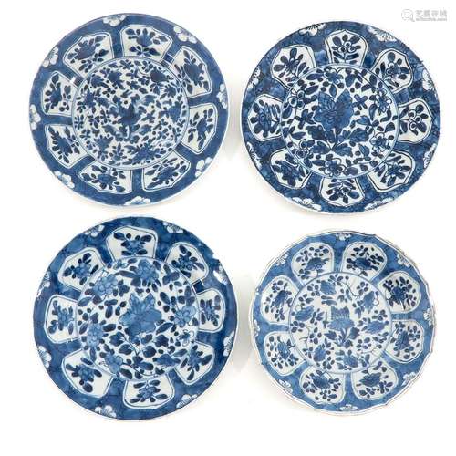 A Collection of 4 Blue and White Plates