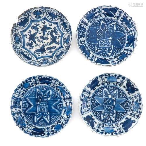 A Collection of 4 Blue and White Plates