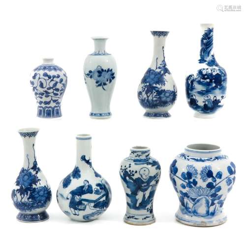 A Collection of 8 Small Vases