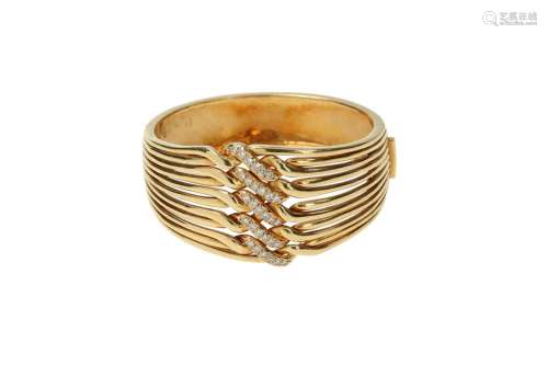An 18-kt gold rigid bracelet