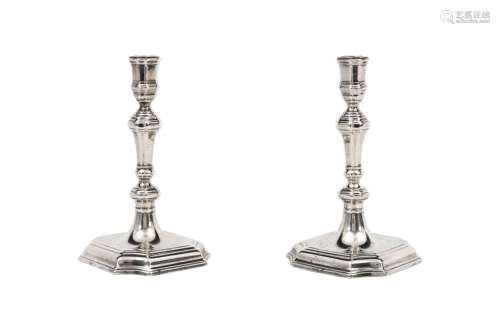 A pair of silver candlesticks. Master’s mark WS
