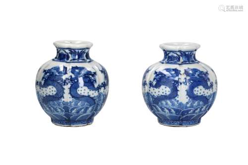 A pair of blue and white lobed porcelain vases