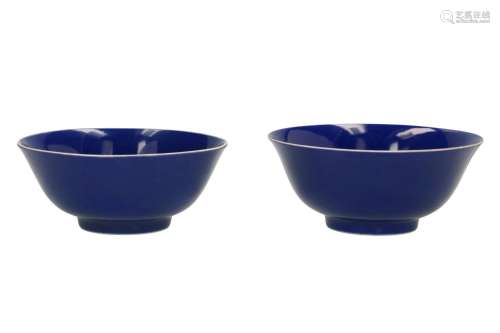 A lot of two blue glazed porcelain bowls. Marked with seal m...