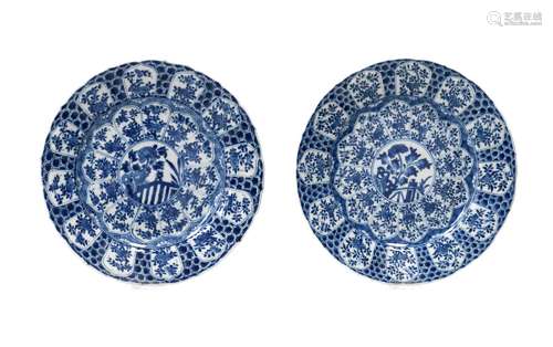 A pair of blue and white porcelain dishes with scalloped rim...