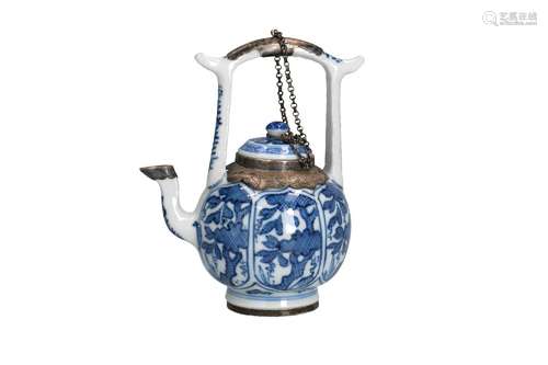 A blue and white porcelain lidded jug with silver mounting, ...