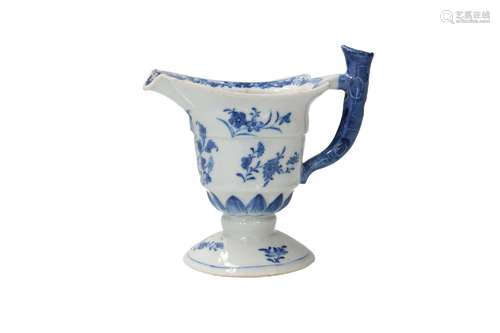 A blue and white porcelain jug, decorated with flowers