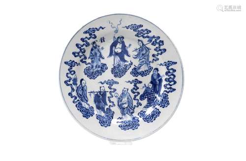 A blue and white porcelain dish, decorated with the eight im...