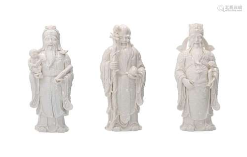 A set of three blanc de Chine porcelain sculptures, depictin...