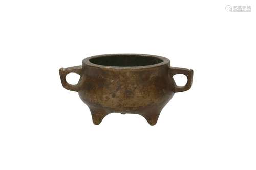 A bronze tripod censer with two ears