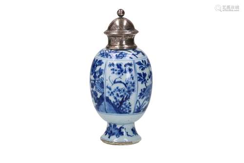 A blue and white porcelain tea caddy, decorated with blossom...