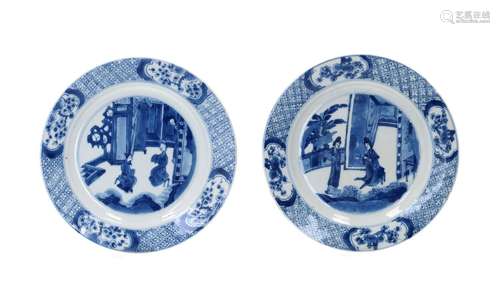 A pair of blue and white porcelain dishes, decorated with sc...