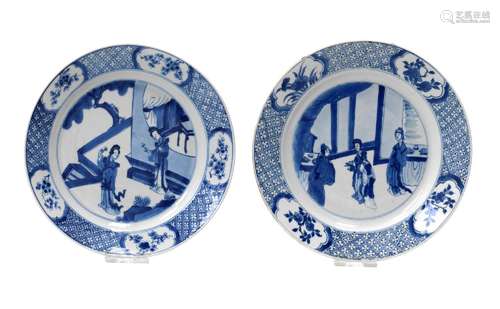 A pair of blue and white porcelain dishes, decorated with sc...