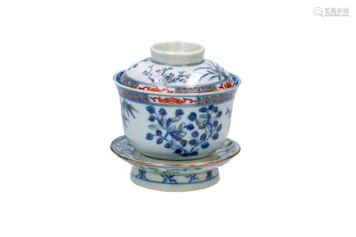 A polychrome porcelain lidded cup on porcelain base, decorat...