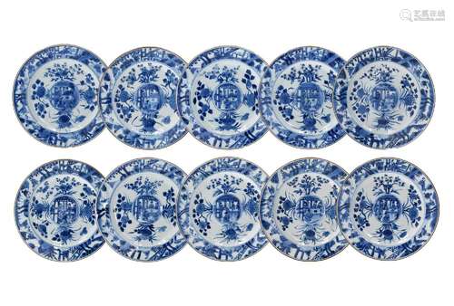 A set of ten blue and white porcelain dishes, decorated with...