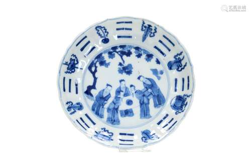 A blue and white porcelain deep saucer with lobed and scallo...