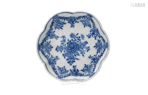 A blue and white porcelain pattipan with scalloped rim, deco...