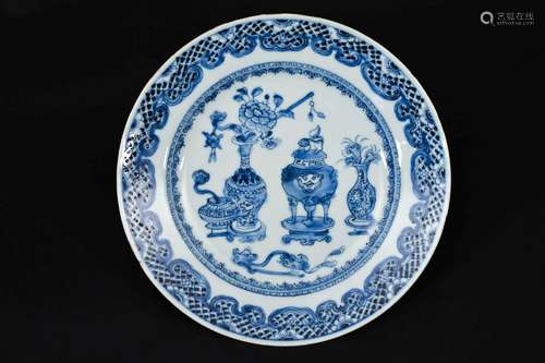 A set of 12 blue and white porcelain dishes, decorated with ...