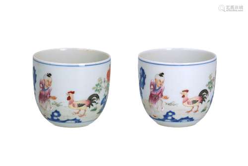 A pair of polychrome porcelain chicken cups