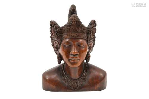 A finely carved wooden sculpt