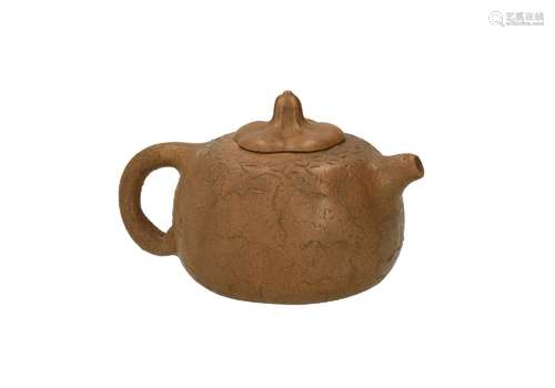 A duanni Yixing teapot in the shape of a pumpkin