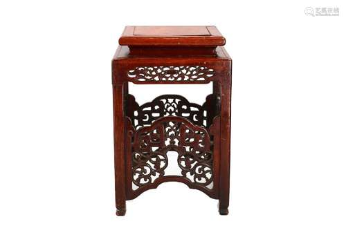 A carved wooden stool