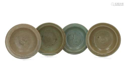 A lot of four Longquan celadon glazed deep saucers, of which...