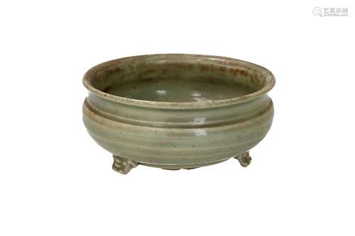 A celadon glazed tripod censer