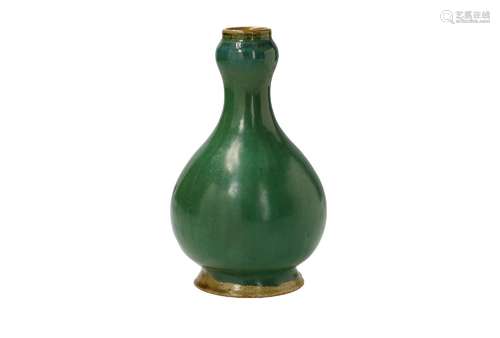 A celadon glazed garlic vase