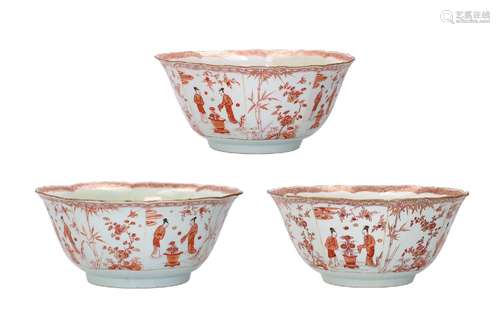 A set of three octagonal white and iron red porcelain bowls ...