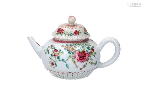 A famille rose porcelain teapot, decorated with flowers