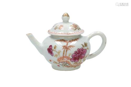 A famille rose porcelain teapot, decorated with flowers and ...