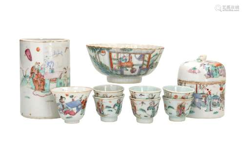 Lot of ten polychrome porcelain objects, including cups, a b...