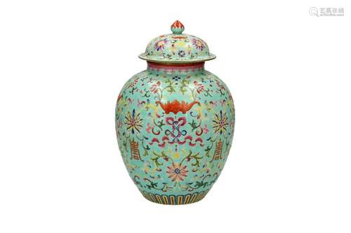 A fencai porcelain lidded jar, decorated with flowers, bats ...