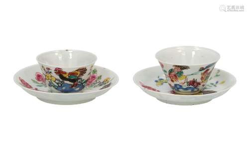 A famille rose porcelain cup with saucer, decorated with roo...