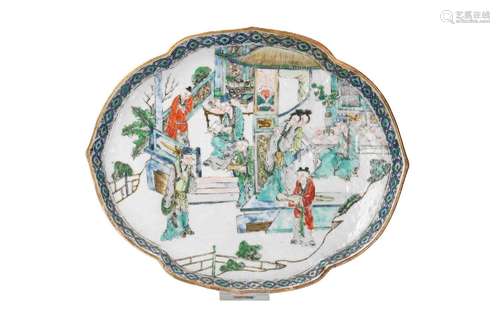 A polychrome porcelain serving dish, decorated with flowers ...