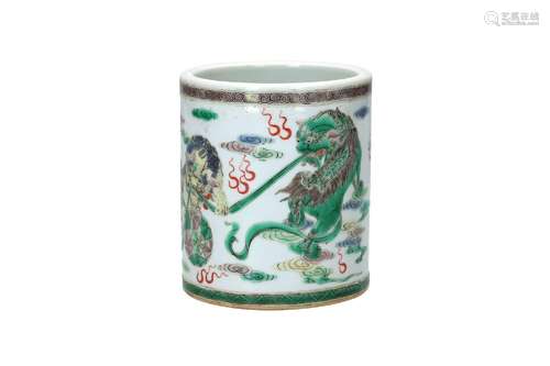 A famille verte porcelain brush pot, decorated with kilins