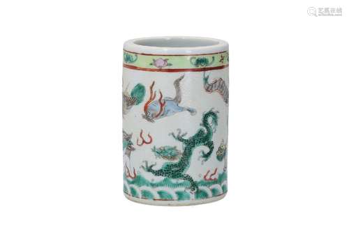 A polychrome porcelain brush pot, decorated with mythical an...