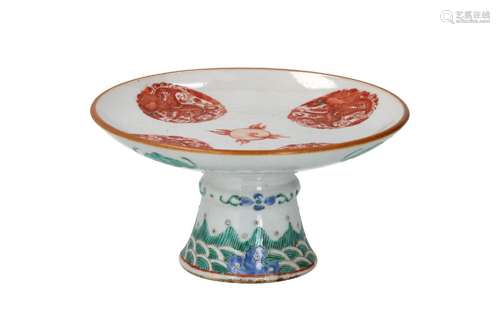 A polychrome porcelain tazza, decorated with iron red dragon...