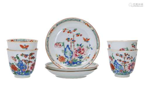 A set of four famille rose porcelain cups with three saucers...