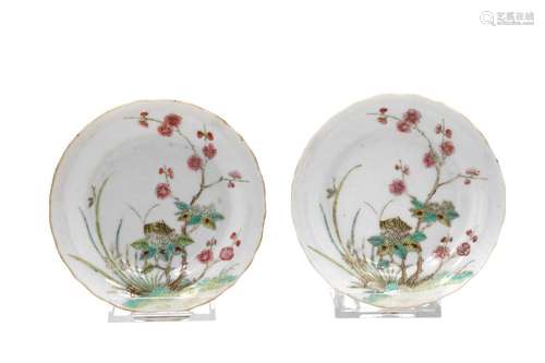 A pair of polychrome porcelain saucers with scalloped rim, d...