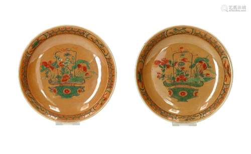 A pair of famille verte on capucine fond dishes, decorated w...