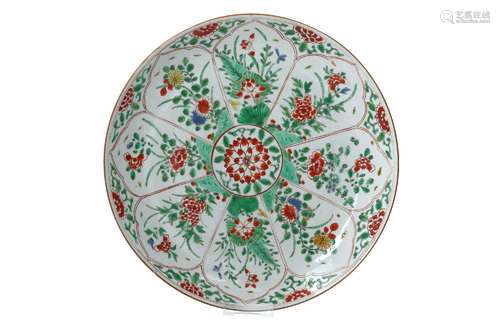 A famille verte porcelain charger, decorated with flowers