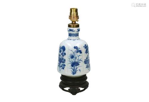 A blue and white porcelain vase, turned into a lamp, decorat...