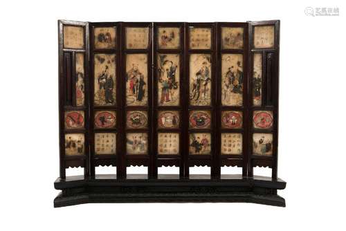 A wooden and marble tablescreen, decorated with immortals, a...