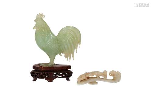 A carved jade sculpture on wooden base, depicting a rooster