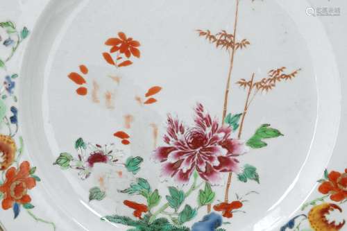 A famille rose porcelain charger, decorated with fruits, flo...