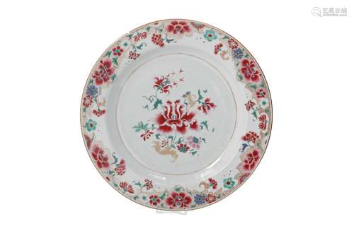 A famille rose porcelain charger, decorated with flowers