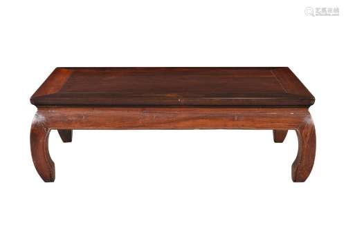 A rosewood coffee table