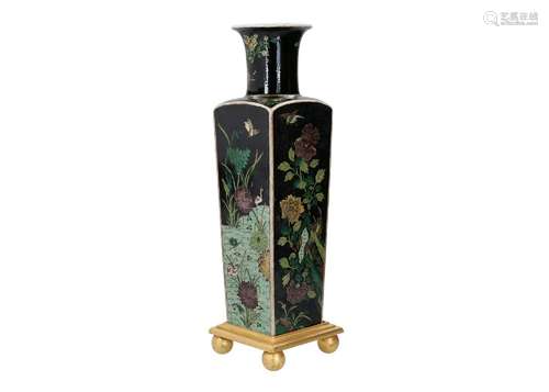 A square famille noir porcelain vase, decorated with flowers...