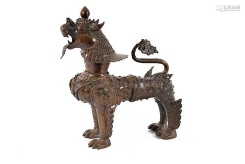 A bronze sculpture depicting a winged lion